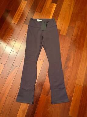 Fabletics PowerHold Define Split Hem Flare Pants in Dark Purple